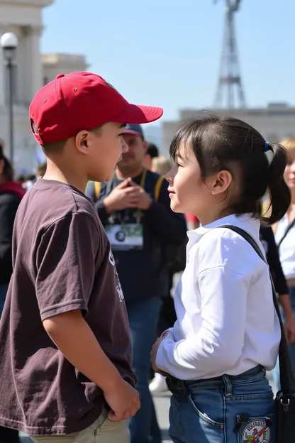 Garçon et fille se font face dans le public