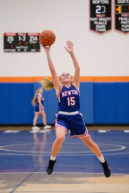 L'équipe de basket-ball des Newton Girls prend le terrain