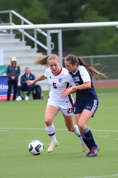 Les entraîneurs de soccer des filles discutent des stratégies