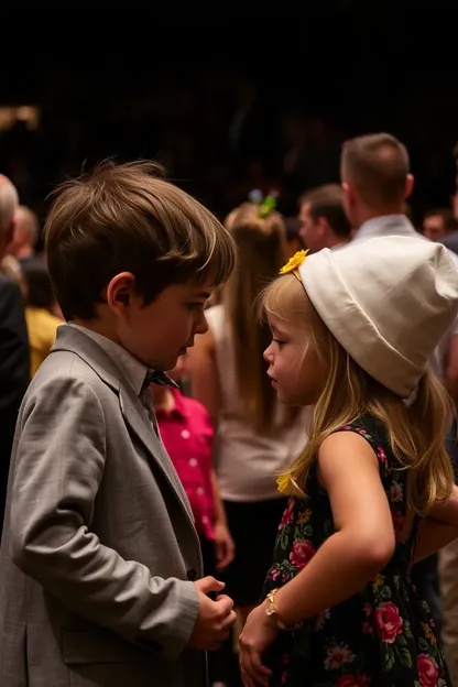 Youthful Duo Faces Each Other in Crowd