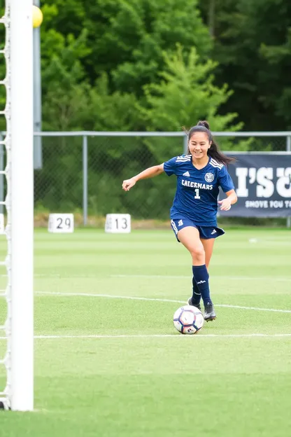 セクションV女子サッカーのファンはチームを応援する