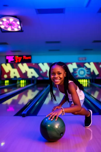 Alegria Juvenil da Menina Negra no Bowling